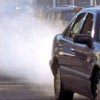 image of car emitting excessive exhaust smoke