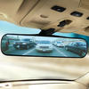 car in rear view mirror