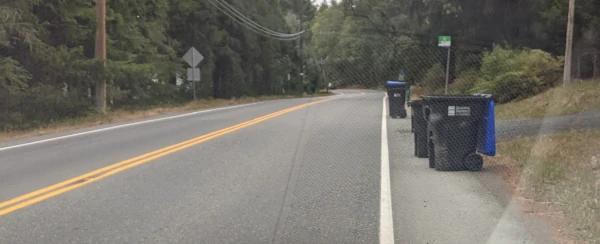 image of bins on the shoulder of the road