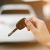image of key with car in background