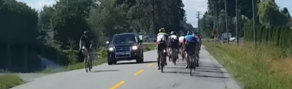 image of cyclists hogging the lane