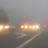 image of traffic in the fog