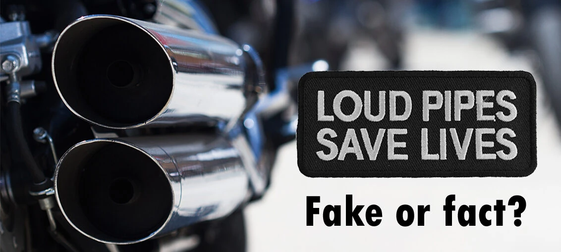 Motorcycle exhaust muffler with text reading loud pipes save lives 
