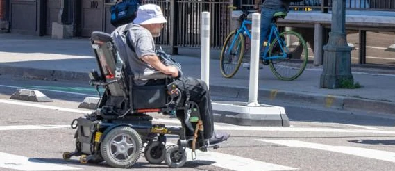 image of mobility scooter in a crosswalk