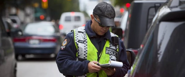 image of police officer at driver's window