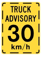 truck advisory sign suggesting slow driving