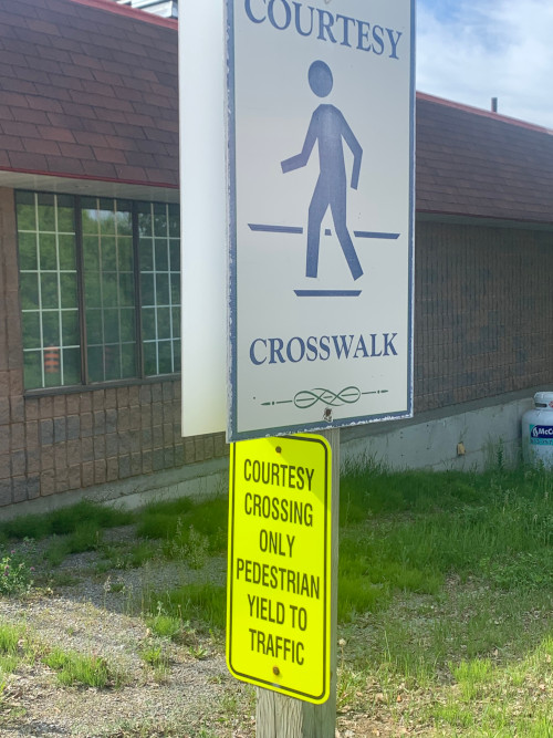 courtesy crosswalk signs