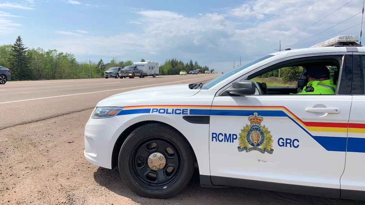 Police vehicle observing traffic on a highway