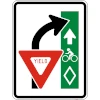 traffic sign requiring drivers to yield to traffic in the cycle lane when turning right across it