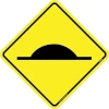 advisory traffic sign warning of speed bump in the road ahead